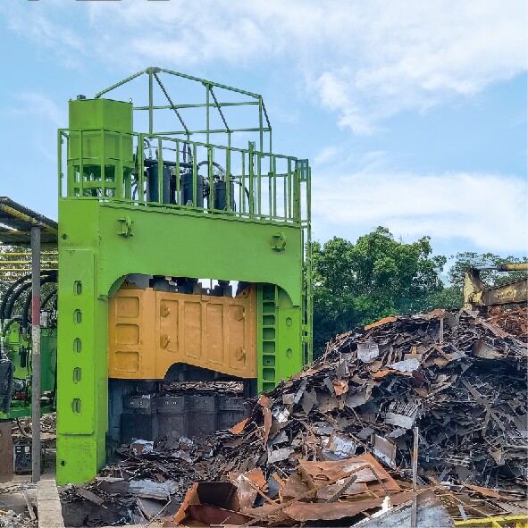 Gantry scrap shear beside a scrap pile